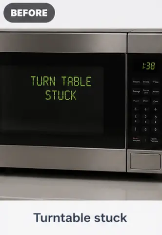 Microwave exterior displaying a turntable stuck error message.