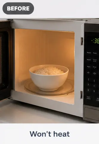 Open microwave with food inside failing to heat up.